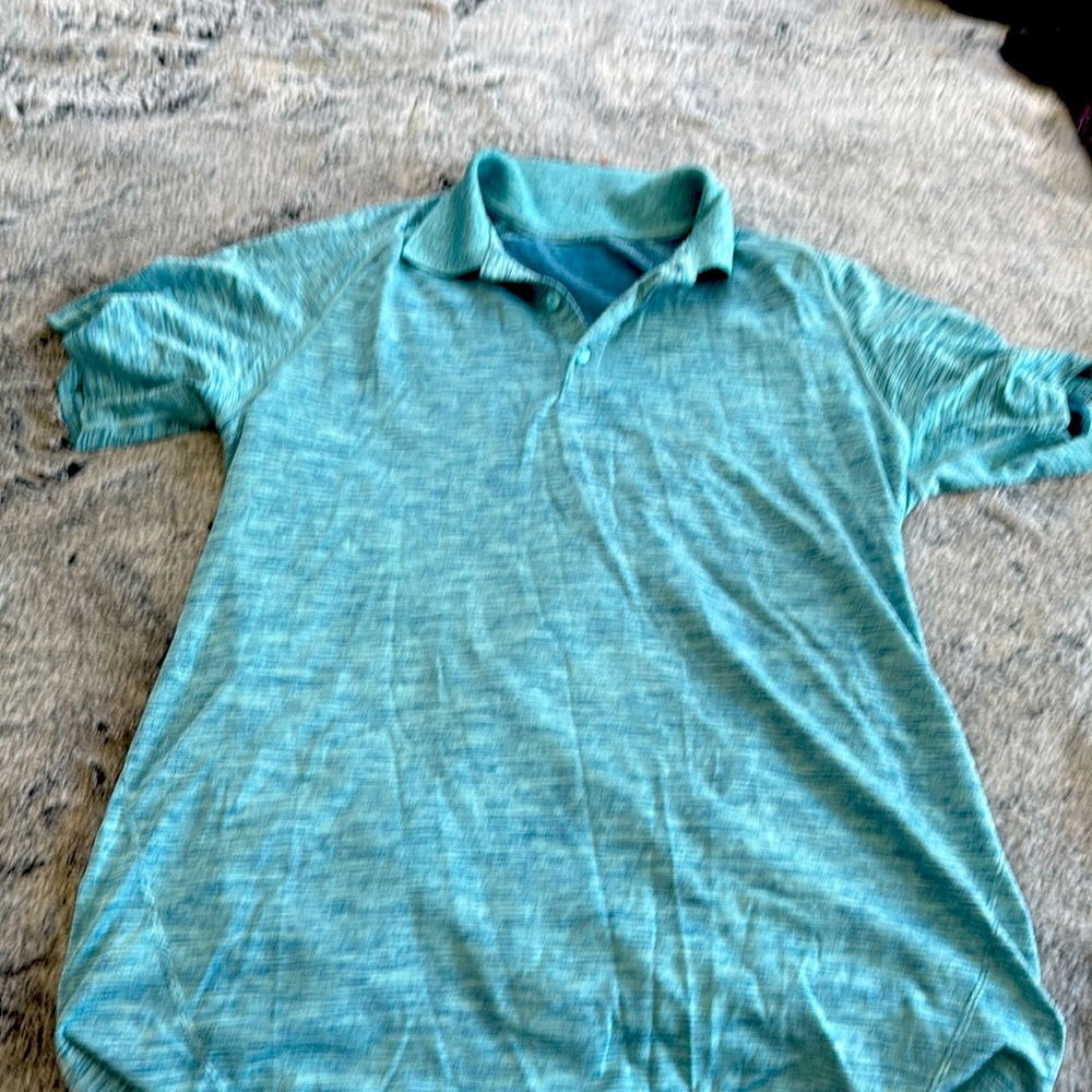 Men’s Lulu blue Performance polo worn once like new without tags